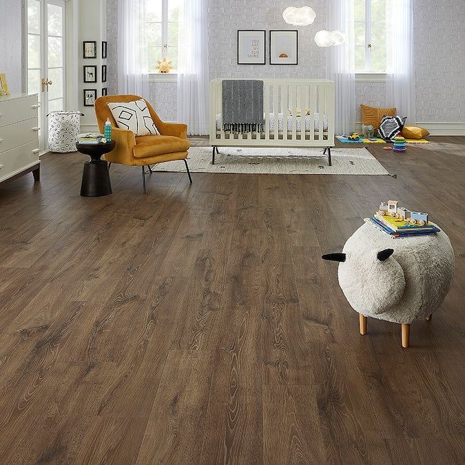 STAINMASTER PetProtect Stockette Oak 12-mm T x 7-1/2-in W x 47-1/4-in L Waterproof Wood Plank Laminate Flooring (22.09-sq ft / Carton)