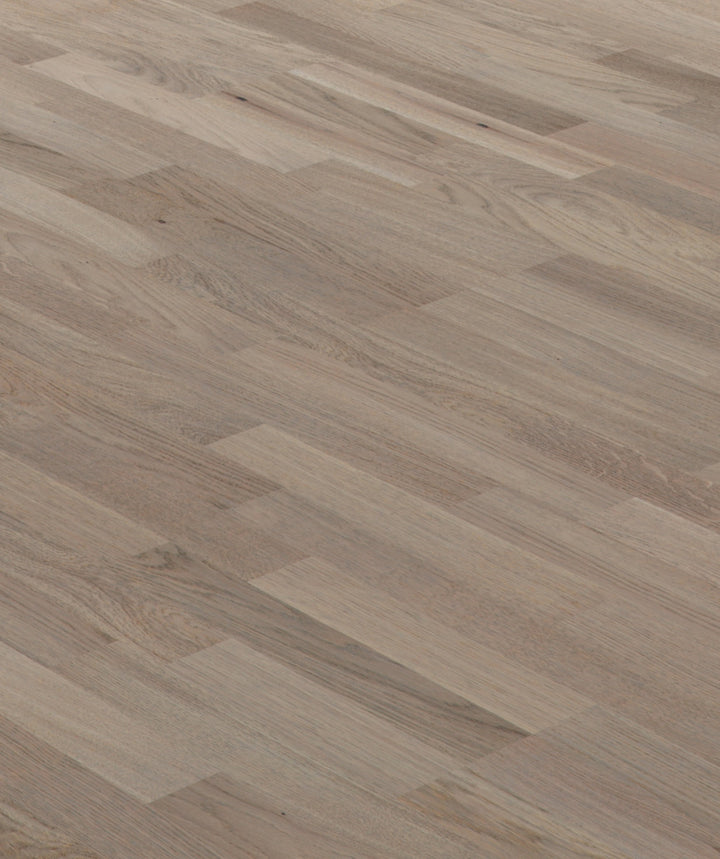 allen + roth European white oak Smokey is an Oak wood floor with gray, a wire brushed texture, and a low-gloss finish that highlights the wood’s natural variation hardwood flooring — primary plank view