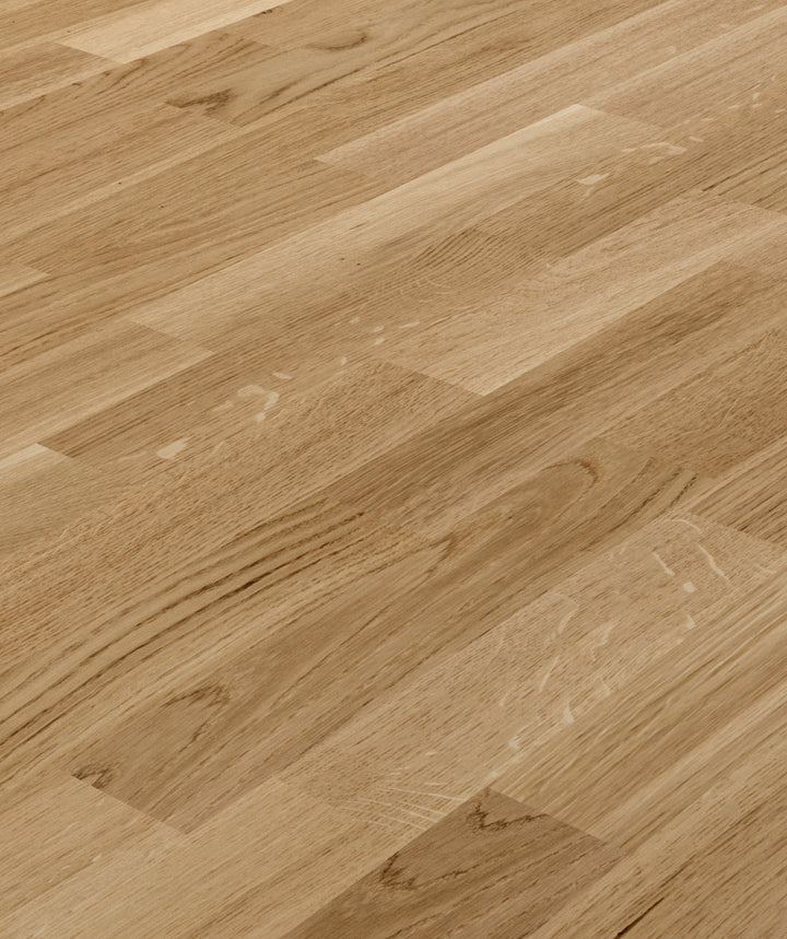 allen + roth European white oak Brushed is an Oak wood floor with brown, a wire brushed texture, and a low-gloss finish that highlights the wood’s natural variation hardwood flooring — primary plank view