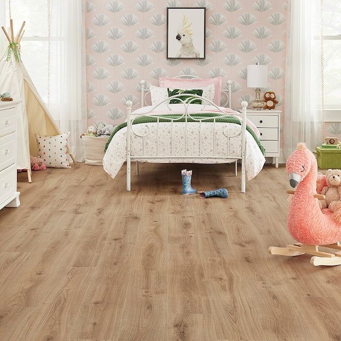STAINMASTER PetProtect Tanglewood Oak 12-mm T x 7-1/2-in W x 47-1/4-in L Waterproof Wood Plank Laminate Flooring (22.09-sq ft / Carton)