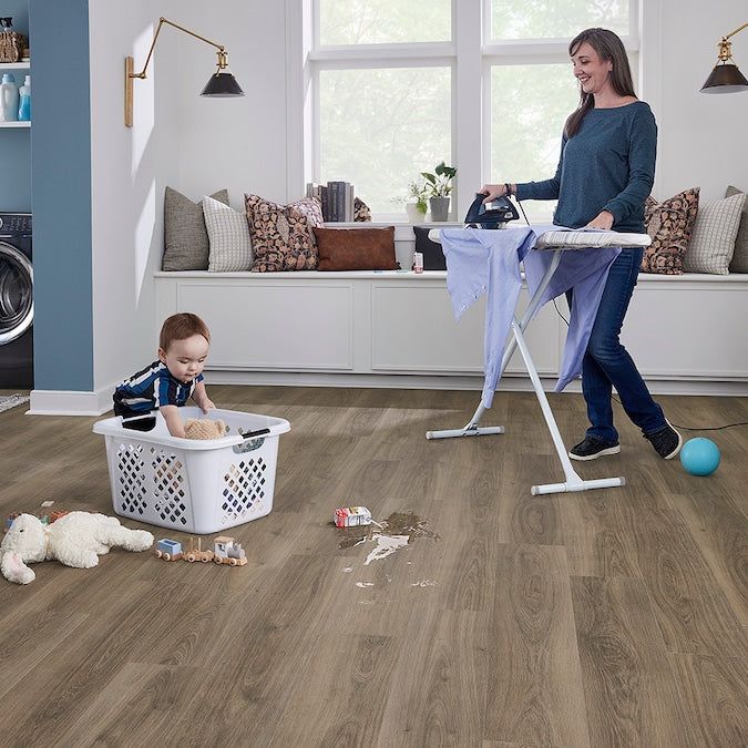 STAINMASTER PetProtect Hastings Point Oak 12-mm T x 7-1/2-in W x 47-1/4-in L Waterproof Wood Plank Laminate Flooring (22.09-sq ft / Carton)
