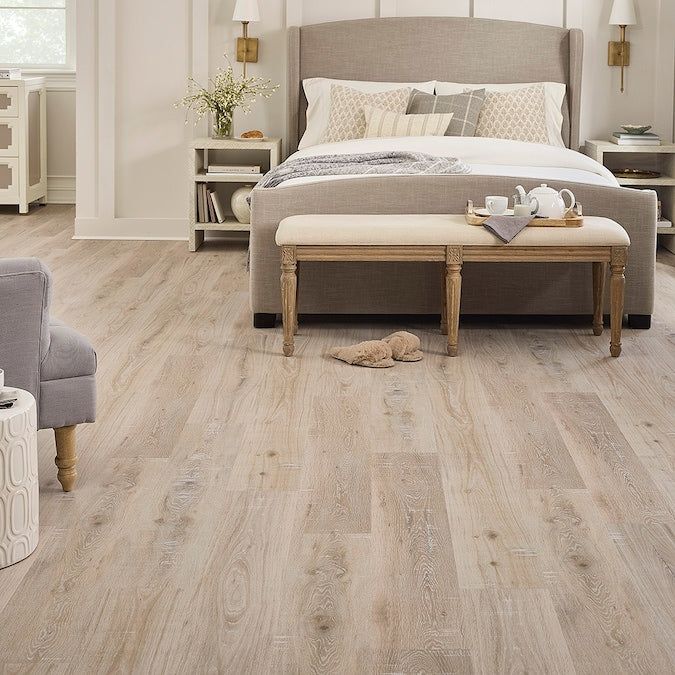 STAINMASTER PetProtect Amberley Oak 12-mm T x 7-1/2-in W x 47-1/4-in L Waterproof Wood Plank Laminate Flooring (22.09-sq ft / Carton)