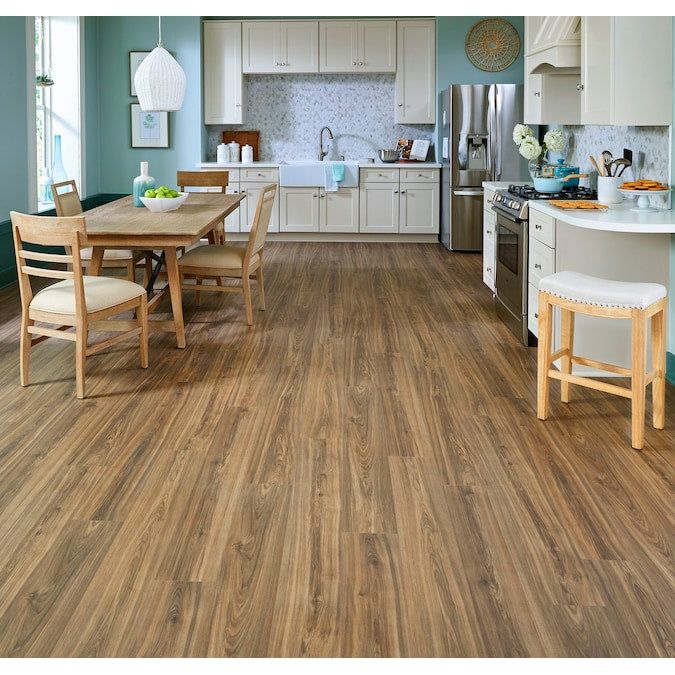 STAINMASTER PetProtect Bittersweet Hickory 12-mm T x 7-1/2-in W x 50-in L Waterproof Wood Plank Laminate Flooring (23.69-sq ft / Carton)