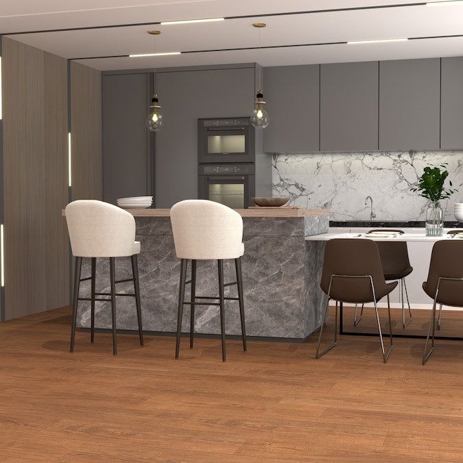 STAINMASTER Gunstock Oak 10-mm T x 7-1/2-in W x 50-in L Waterproof Wood Plank Laminate Flooring (21.06-sq ft / Carton)