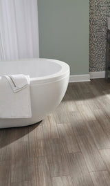 Style Selections Chateau 6-in x 24-in Groutable Water Resistant Peel and Stick Luxury Flooring (1-sq ft)