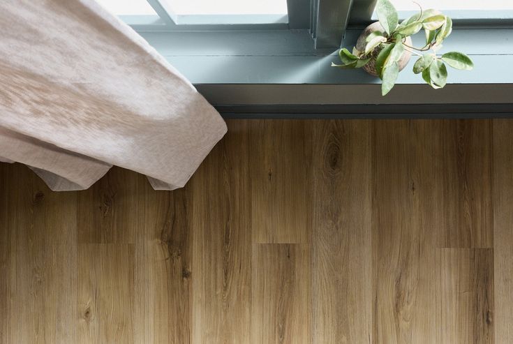 STAINMASTER Golden Belle Hickory 6-mm x 7-in W x 48-in L Waterproof Interlocking Luxury Vinyl Plank Flooring (19.22-sq ft/case)
