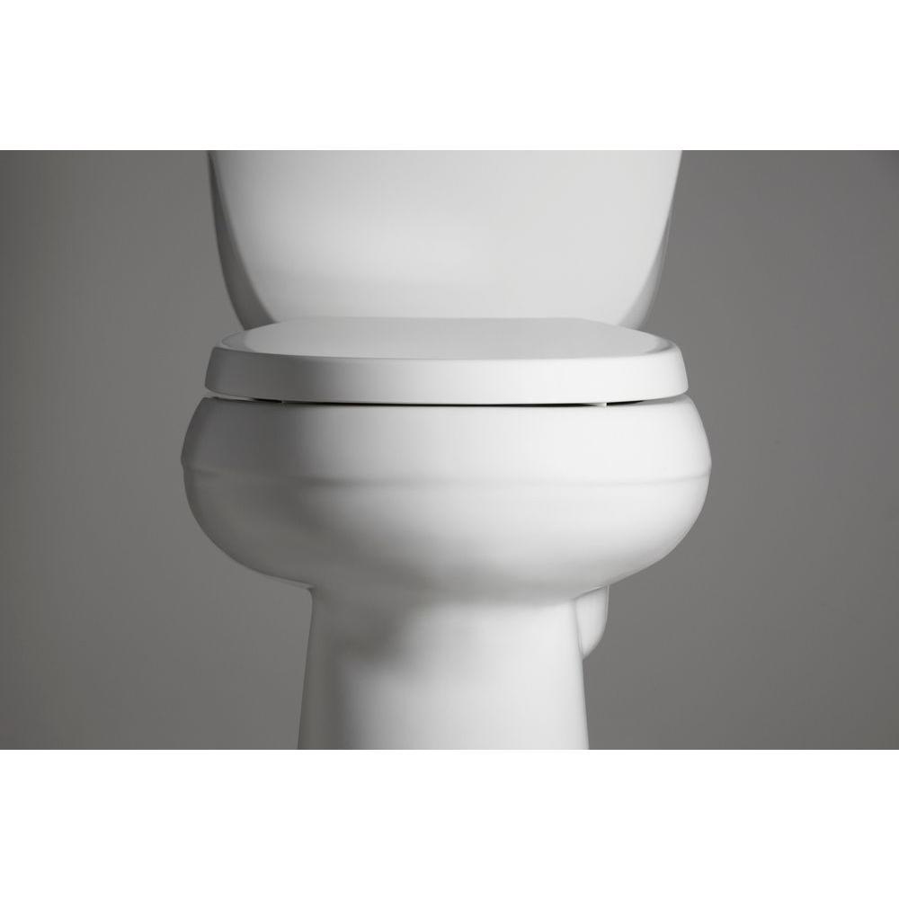 Cimarron Comfort Height 2-Piece 1.28 GPF Single Flush Round Toilet with AquaPiston Flush Technology in White - Super Arbor