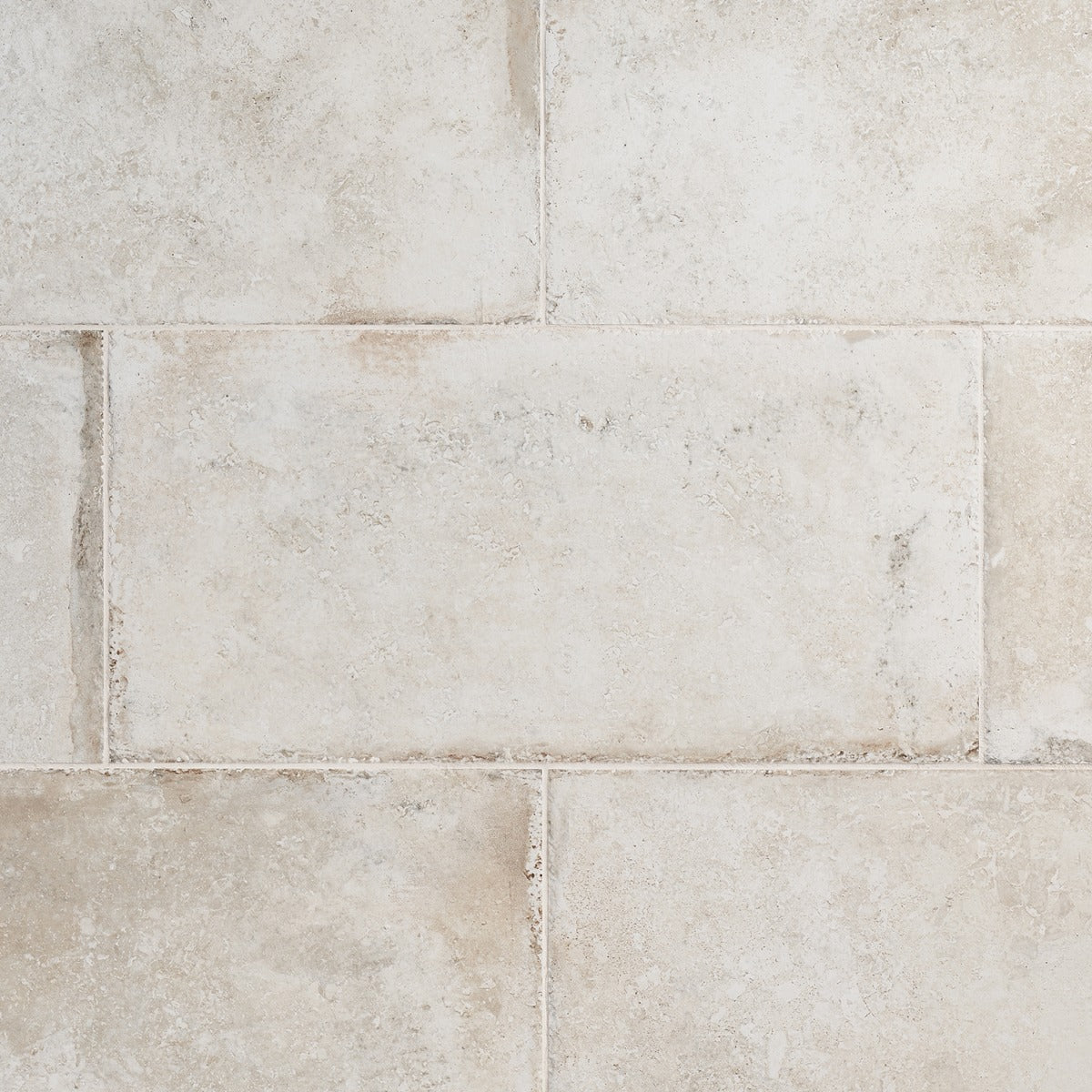 Seville Olimpia White 12x24 Matte Porcelain Tile - Travertine Look