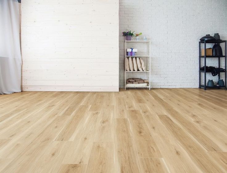 Style Selections Natural Hickory 20-mil x 7-in W x 48-in L Waterproof Interlocking Luxury Vinyl Plank Flooring