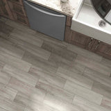 Style Selections Woods Vintage Gray 6-in x 24-in Porcelain Wood Look Floor Tile (Common: 6-in x 24-in; Actual: 5.84-in x 23.5-in)