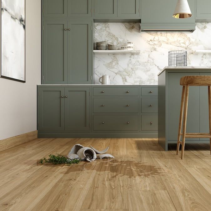 STAINMASTER Sunnyview Hickory 10-mm T x 7-1/2-in W x 50-in L Waterproof Wood Plank Laminate Flooring (21.06-sq ft / Carton)
