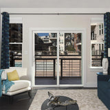 JELD-WEN FiniShield V-2500 72-in x 80-in, 4-9/16-in Jamb Bronze Vinyl Right-Hand Sliding Double Patio Door with Low-E Argon Glass and Screen