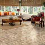 Style Selections Tavern Oak 7.59-in W x 4.23-ft L Embossed Wood Plank Laminate Flooring