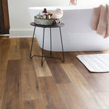 Style Selections Hickory Medley 12-mm T x 6-in W x 50-in L Water Resistant Wood Plank Laminate Flooring (17.07-sq ft / Carton)