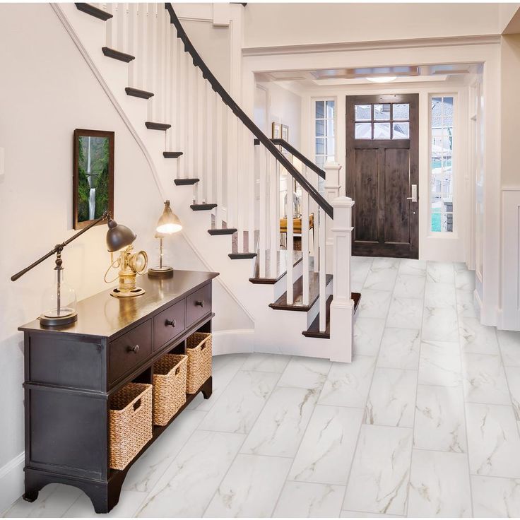 Florida Tile Home Collection Michelangelo Calacatta Rectified 12 in. x 24 in. Porcelain Floor and Wall Tile (13.3 sq. ft. /case)