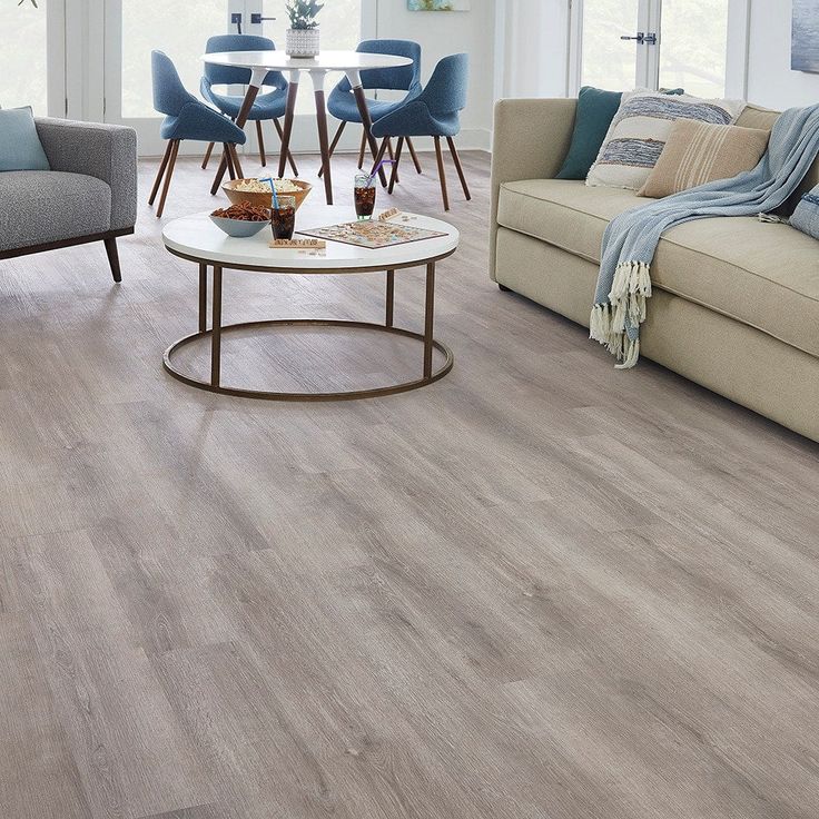 STAINMASTER Barnes Oak 6-mm x 7-3/32-in W x 47-in L Waterproof Interlocking Luxury Vinyl Plank Flooring (17.33-sq ft/case)