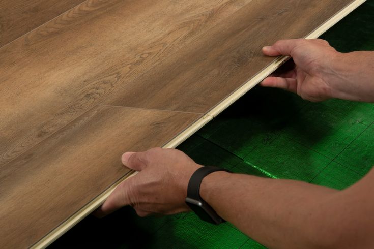 CALI Legends Outrigger Oak 12-mm x 9-in W x 60-in L Water Resistant Interlocking Luxury Vinyl Plank Flooring (22.44-sq ft/case)