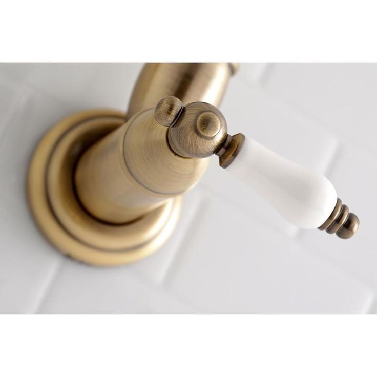 Kingston Brass Restoration Antique Brass 2-Handle Wall-Mount Pot Filler Handle Kitchen Faucet