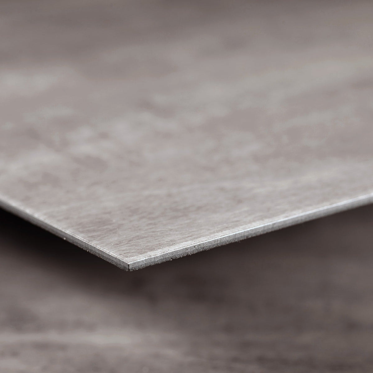 Lucida USA Gluecore Satinstone Gray 22-mil x 12-in W x 24-in L Waterproof Glue Down Luxury Vinyl Plank Flooring (36-sq ft/ Carton)