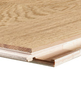 allen + roth European white oak Brushed is an Oak wood floor with brown, a wire brushed texture, and a low-gloss finish that highlights the wood’s natural variation hardwood flooring — surface grain detail
