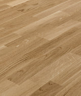 allen + roth European white oak Brushed is an Oak wood floor with brown, a wire brushed texture, and a low-gloss finish that highlights the wood’s natural variation hardwood flooring — primary plank view