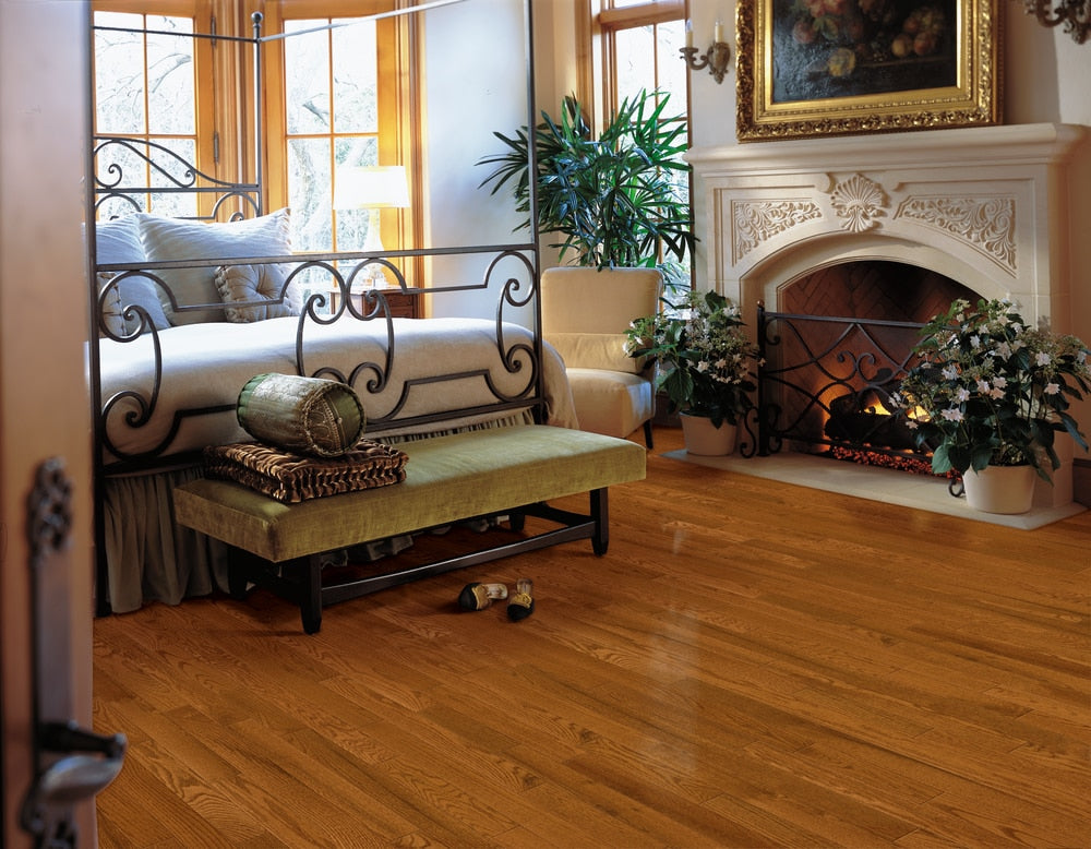 Bruce Frisco Gunstock Oak 3-1/4-in W x 3/4-in T x 84-in Smooth/Traditional Solid Hardwood Flooring (22-sq ft / Carton)