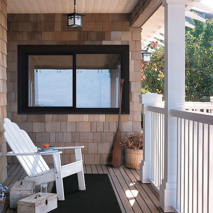 JELD-WEN FiniShield V-4500 59-1/2-in x 35-1/2-in x 3-in Jamb Left-operable Vinyl Black Sliding Window Full Screen Included