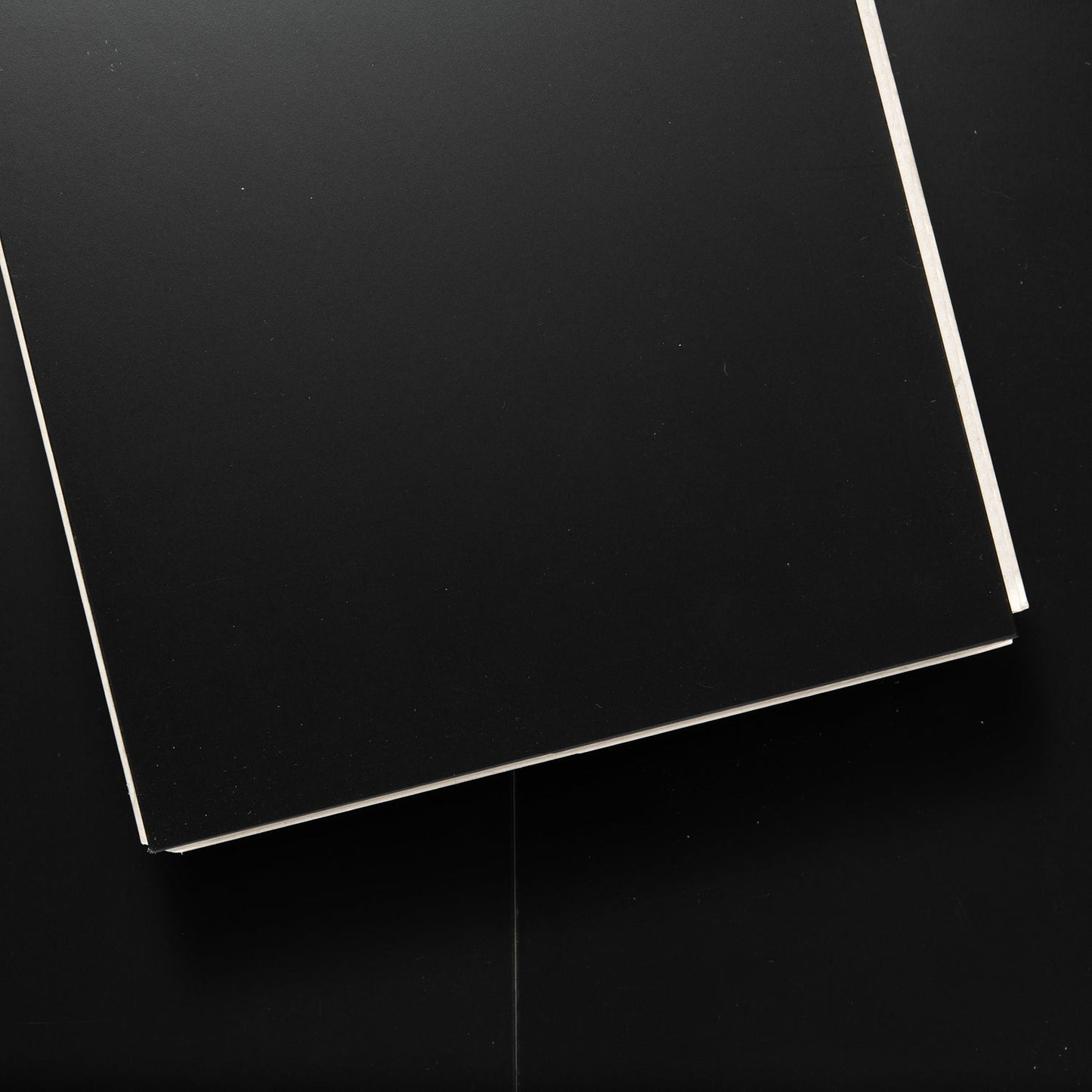 Lucida USA MaxCore Piano Black 7-3/32-in Wide x 5-1/2-mm Thick Waterproof Interlocking Luxury Vinyl Plank Flooring (24.5-sq ft)