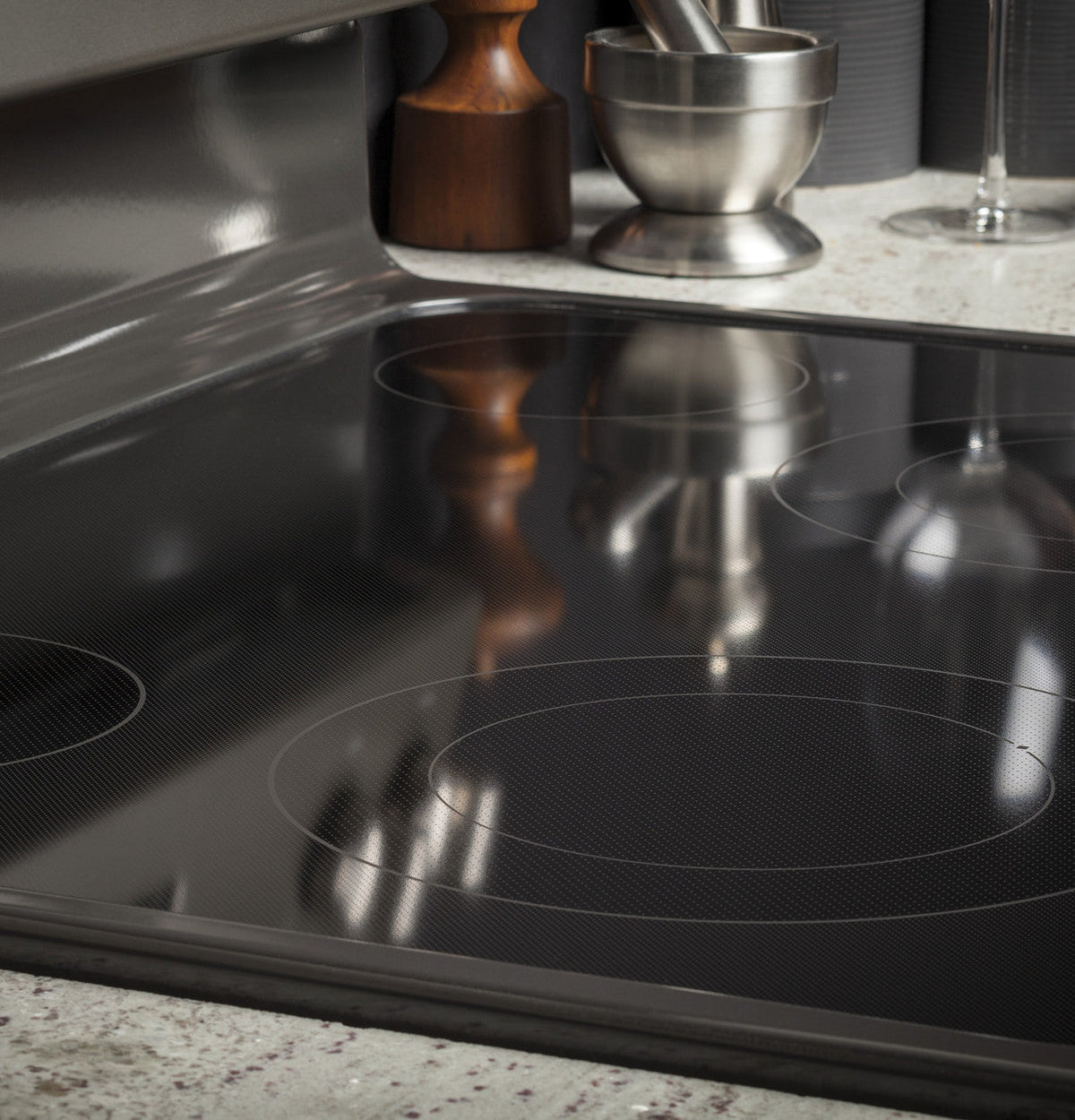 GE 30-in Smooth Surface 4 Elements 5.3-cu ft Self-Cleaning Freestanding Electric Range (Stainless Steel)