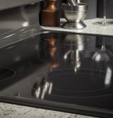 GE 30-in Smooth Surface 4 Elements 5.3-cu ft Self-Cleaning Freestanding Electric Range (Stainless Steel)