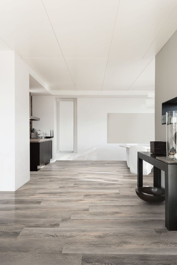 CALI Longboards Oceanic Oak Gray 20-mil x 9-in W x 70-in L Waterproof Interlocking Luxury Vinyl Plank Flooring (26.62-sq ft/ Carton)