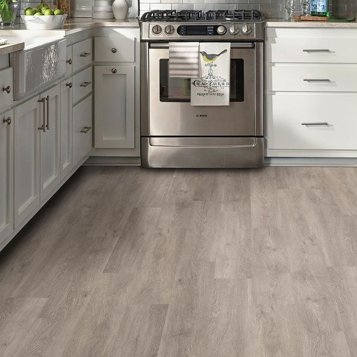 TrafficMaster Taupe Oak 6 in. x 36 in. Peel and Stick Vinyl Plank (36 sq. ft. / case)