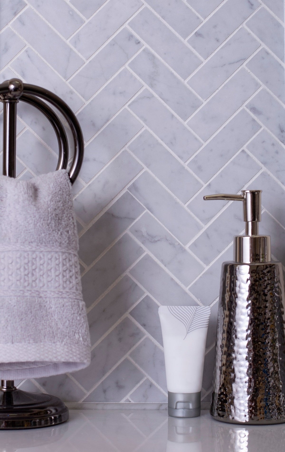 Apollo Tile White 11-in x 12-in Polished Natural Stone Marble Herringbone Patterned Floor and Wall Tile (5.28-sq. ft/ Carton)