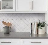 Apollo Tile Winterland Pearl White 11-in x 11-in Polished Composite Hexagon Patterned Floor and Wall Tile (4.51-sq. ft/ Carton)