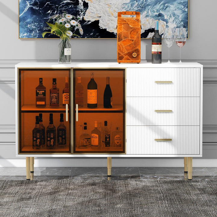 JIMSMAISON The amber-yellow glass doors and marble sticker tabletop are elegant and understated, and the gold metal legs reflect the texture, the design of this cabinet combines the features of modern simplicity and light luxury