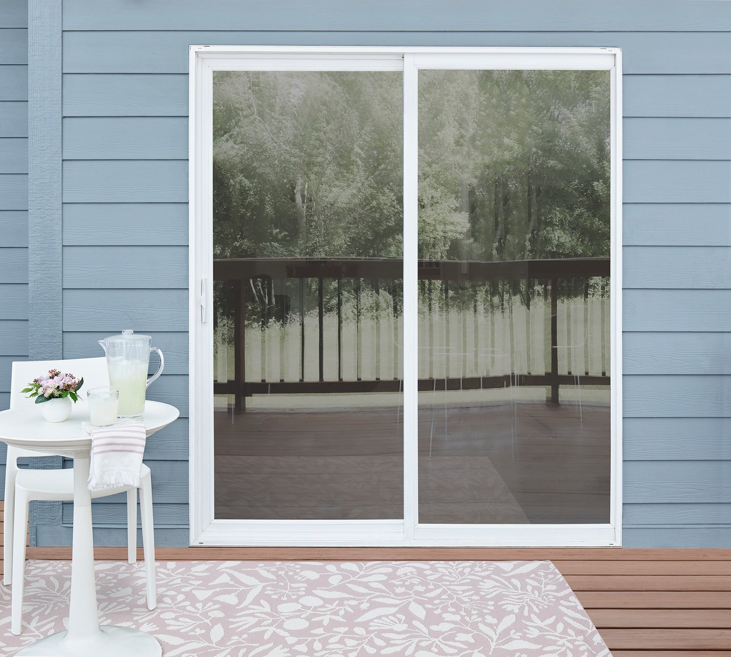 Pella 72-in x 96-in Vinyl Sliding, Left-hand sliding – installed room view