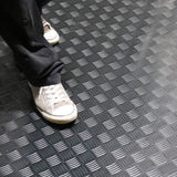 Rubber-Cal "Diamond-Grip" 4 ft. x 30 ft. Black Commercial PVC Flooring