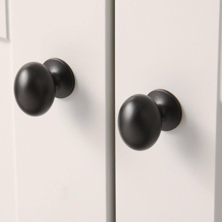 Large Football 1-3/8 in. matte black Classic Oval Cabinet Knob (25-Pack)