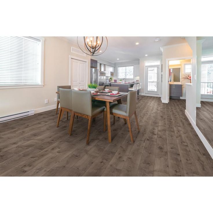 TrafficMASTER Anniston Oak 7 mm Thick x 7-2/3 in. Wide x 50-5/8 in. Length Laminate Flooring (24.17 sq. ft. / case)