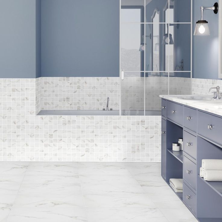 Florida Tile Home Collection Michelangelo Calacatta Rectified 12 in. x 24 in. Porcelain Floor and Wall Tile (13.3 sq. ft. /case)