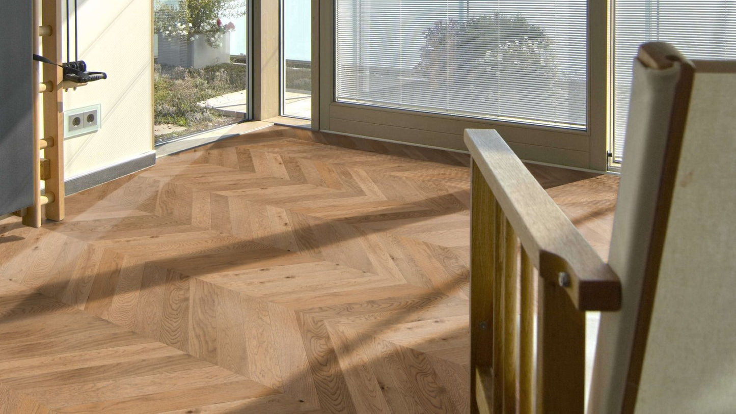 Solidfloor Oak Chantilly Chevron hardwood flooring — installed room view