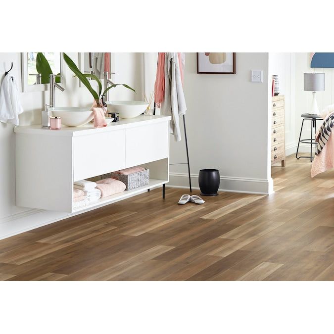 Style Selections Hickory Medley 12-mm T x 6-in W x 50-in L Water Resistant Wood Plank Laminate Flooring (17.07-sq ft / Carton)