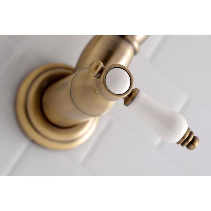 Kingston Brass Bel-Air Antique Brass 2-Handle Wall-Mount Pot Filler Handle Kitchen Faucet