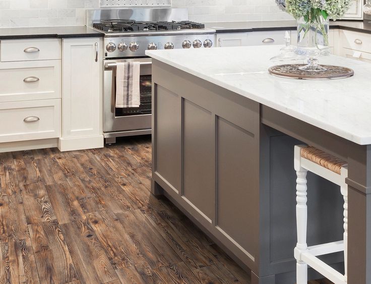 Style Selections Lethbridge Pine 8-in x 48-in Porcelain Wood Look Floor Tile (Common: 8-in x 48-in; Actual: 7.87-in x 47.21-in)