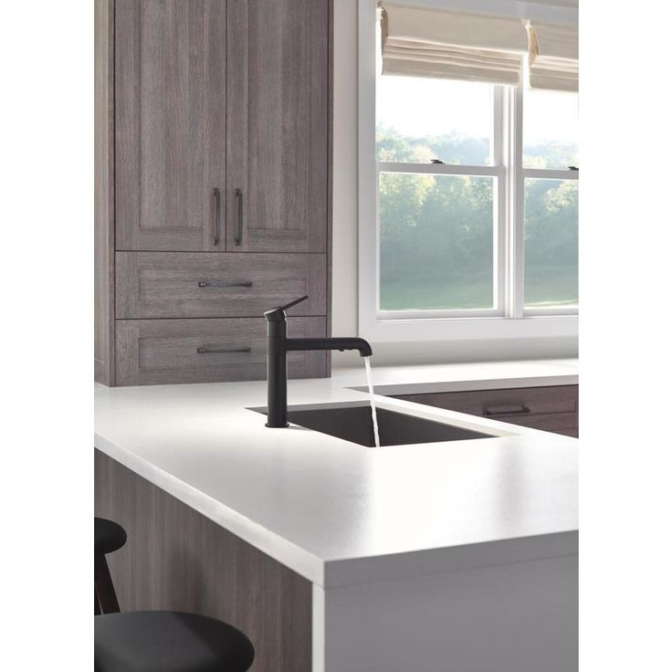 Delta Trinsic Matte Black 1-Handle Deck-Mount Pull-Out Handle Kitchen Faucet