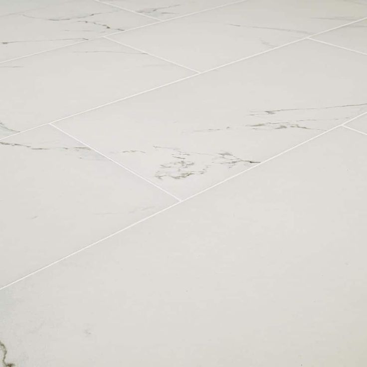 Carrara White 12 in. x 24 in. Matte Porcelain Stone Look Floor and Wall Tile (16 sq. ft./Case)