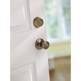Tylo Antique Brass Entry Door Knob and Single Cylinder Deadbolt Combo Pack with Microban Antimicrobial Technology - Super Arbor
