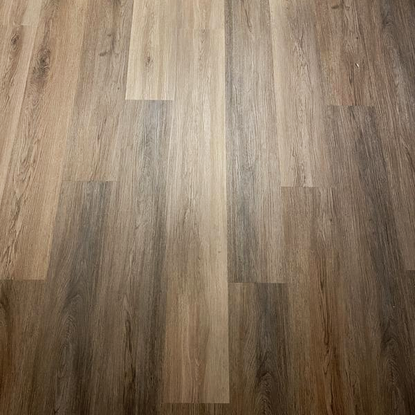 Style Selections Brunette Oak 5-mm x 7-in W x 48-in L Waterproof Interlocking Luxury Vinyl Plank Flooring (23.36-sq ft/case)