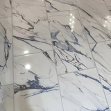 Calacatta Indigo 12 in. x 24 in. Polished Porcelain Floor and Wall Tile (6-Piece, 11.62 sq. ft./Case)