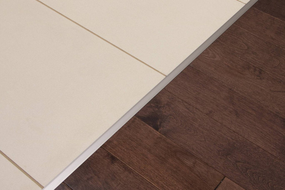 Schluter Systems RENO-T 0.344-in W x 98.5-in L Solid Brass T-Shape Tile Edge Trim - Brass